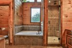 Master bathroom with jetted tub and walk-in shower